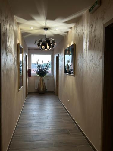 a hallway with a hallwayngth at Villa Potôň 2023 in Horná Potôň