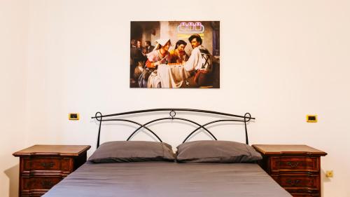 Postel nebo postele na pokoji v ubytování Art Suites Verona