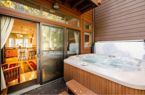 a large jacuzzi tub sitting inside of a house at Village Point 101 in Breckenridge