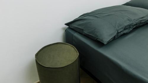 Un ou plusieurs lits dans un hébergement de l'établissement Art Suites Verona