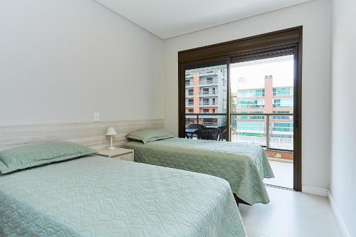 Postel nebo postele na pokoji v ubytování 1108 -Lindo e completo apto com piscina na Praia de Bombas