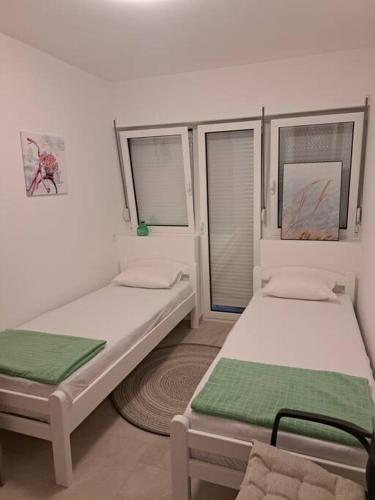 Llit o llits en una habitació de Mina