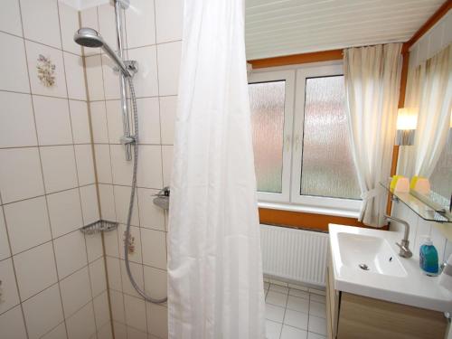 a bathroom with a shower and a sink at Apartment house Atlanta, Pellworm in Pellworm