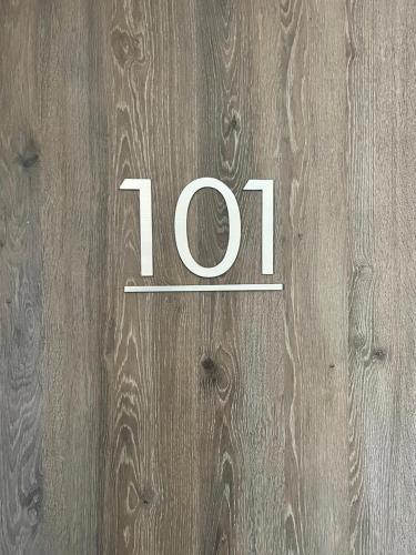 a wooden table with the number on it at Art Gallery Pilar in Pilar
