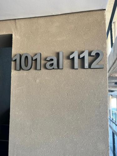 a sign on the side of a building at Art Gallery Pilar in Pilar