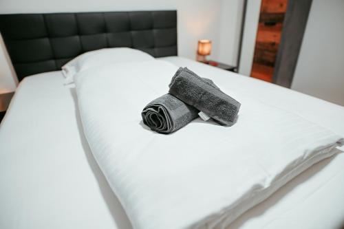 מיטה או מיטות בחדר ב-Vienna Shopping Center 6a Apartment