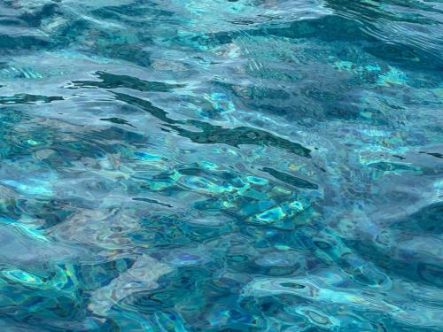a close up of a pool of water at Kinda vip in Al Mashāriqah