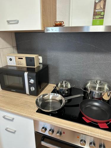 Η κουζίνα ή μικρή κουζίνα στο Ferienwohnung BX