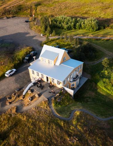 an aerial view of a building with a garage at Hótel Goðafoss Fosshóll in Godafoss