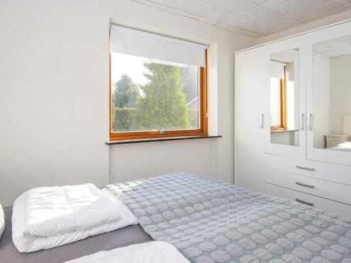 Postel nebo postele na pokoji v ubytování Holiday home Haderslev XXV