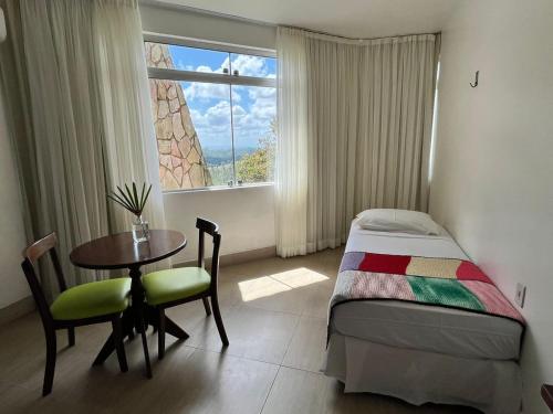 Postel nebo postele na pokoji v ubytování Hotel Fazenda Triunfo