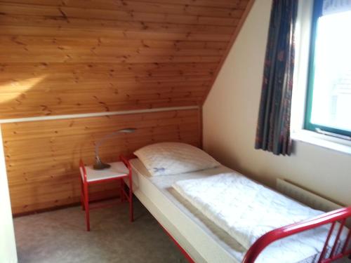 Postel nebo postele na pokoji v ubytování Ferienhaus Strandnah