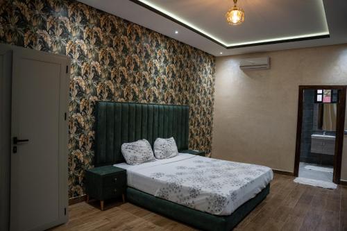 เตียงในห้องที่ VILLA MYAD