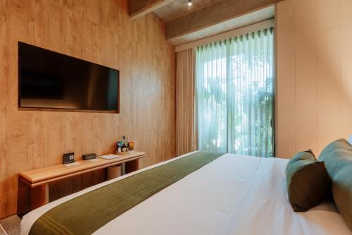 TV a/nebo společenská místnost v ubytování Hotel El Zarzo