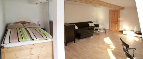 Rúm í herbergi á 3 Seiten Ferienwohnung