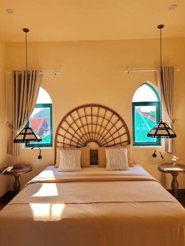 Cama o camas de una habitación en Alsahar Hoi An Boutique Villa