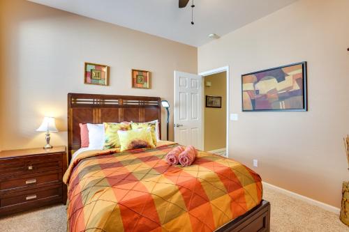 a bedroom with a bed with a stuffed animal on it at 5 Mi to State Farm Stadium Home with Private Pool! in Avondale