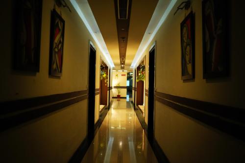 a hallway of a building with a hallwayngth at The Vaishnavi in Deoghar