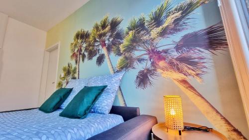 Posteľ alebo postele v izbe v ubytovaní La Résidence Évasion 2 - Original - Gare - Wifi - Relax BNB