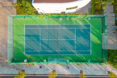 an overhead view of a tennis court at Rosa Alba Resort & Villas Tuy Hoa in Tuy Hoa
