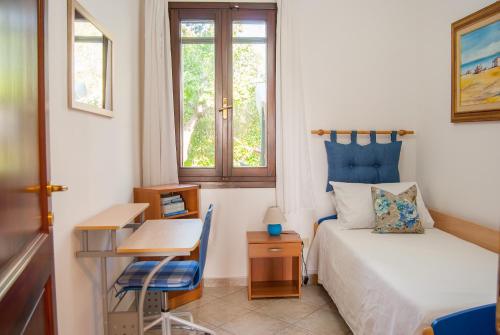 Postel nebo postele na pokoji v ubytování Casa Maddalena