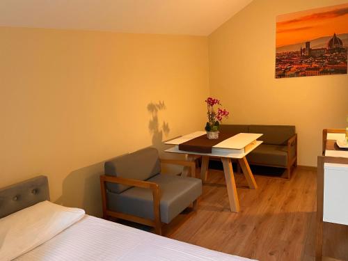 Ένα ή περισσότερα κρεβάτια σε δωμάτιο στο SPA&Hotel MŪSA PARADISE