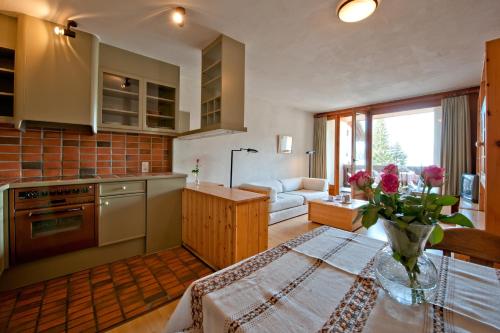 مطبخ أو مطبخ صغير في Hotel Chesa Grischa