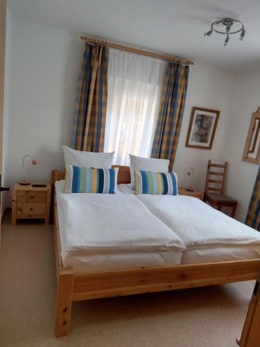 Postel nebo postele na pokoji v ubytování Ferienwohnung Mülli