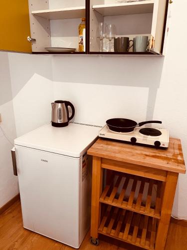 A cozinha ou cozinha compacta de Graz city centr apartment