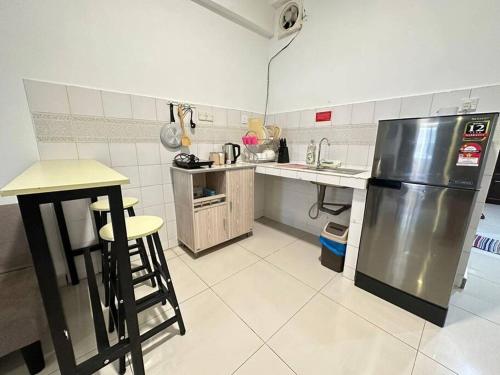 Dapur atau dapur kecil di KK City A2Z Api Api Modern Studio Homestay