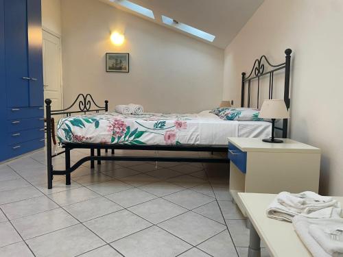 Katil atau katil-katil dalam bilik di La Spezia Vezzano 5 terre - Il Ciliegio