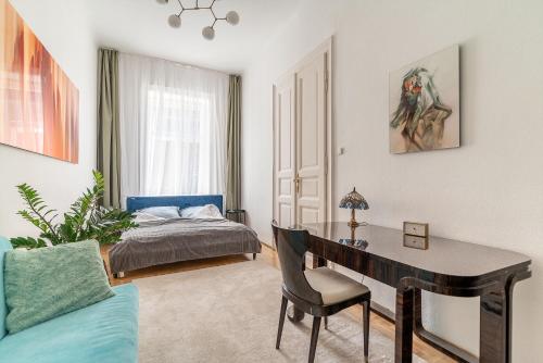 a bedroom with a desk and a bed and a desk at Aviator luxury apartment in the city center in Budapest