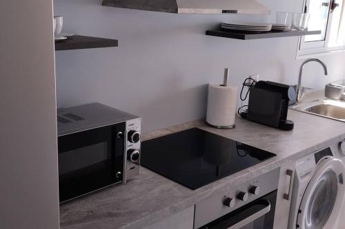 Dapur atau dapur kecil di Apt. 'A Bicuda' by The Cliff Coast Accomodation