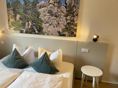 Postel nebo postele na pokoji v ubytování Harzhotel Warnstedter Krug