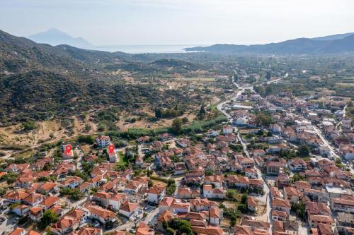 an aerial view of a city with red roofs at Diva Lodge in Sikia