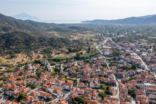 an aerial view of a city with red roofs at Diva Lodge in Sikia