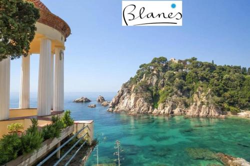 a view of the ocean from a building at Europa Family Apartments in Blanes