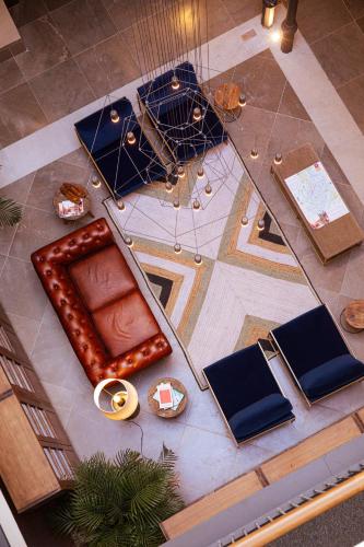 an overhead view of a room with a table and chairs at Casa Alhaja by Shiadu in Seville