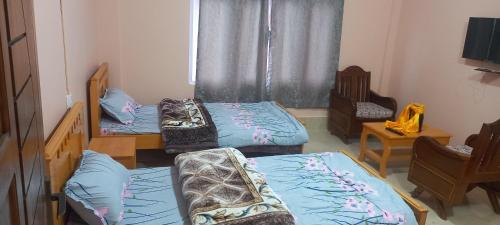 Una cama o camas en una habitación de The Himalayan Nest