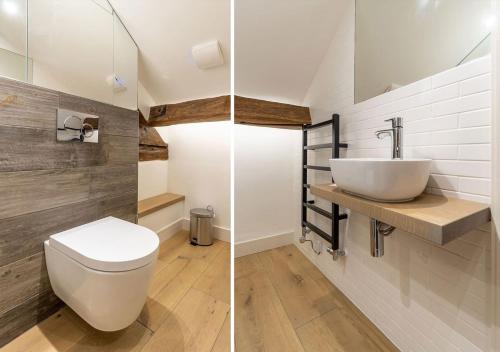 a bathroom with a white toilet and a sink at The Corner Cottage, Romantic 5* for 2, Windermere in Windermere
