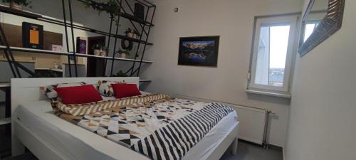 Ένα ή περισσότερα κρεβάτια σε δωμάτιο στο Penthouse Park