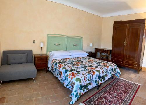 Ένα ή περισσότερα κρεβάτια σε δωμάτιο στο La Casatorre Di Ponticello