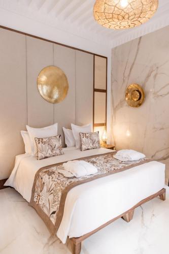 Letto o letti in una camera di Riad Nyla Wellness and Spa