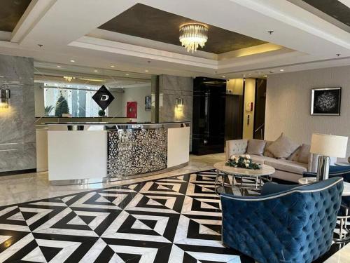 Un lugar para sentarse en Luxury Studio DAMAC TOWER - 1 BEDROOM -JORDAN