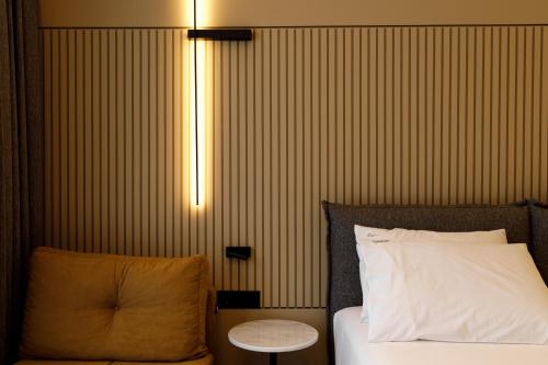 Katil atau katil-katil dalam bilik di Caramel Boutique Hotel