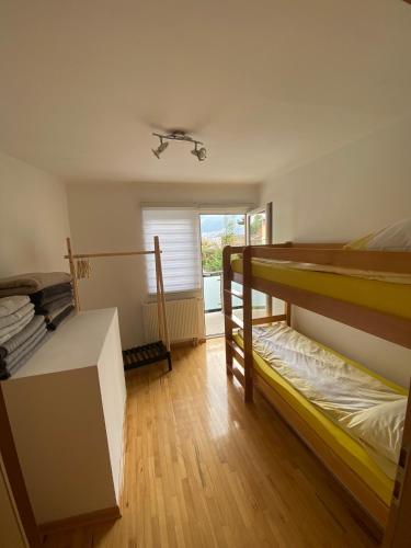 Ένα ή περισσότερα κρεβάτια σε δωμάτιο στο Apartman Meri