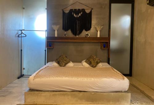 Postel nebo postele na pokoji v ubytování Pacha Tulum Boutique Hotel