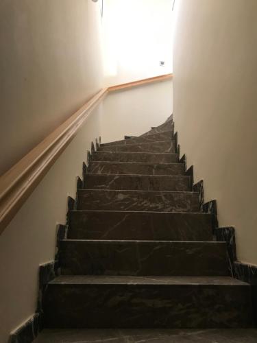 a set of stairs in an empty building at villa soleil in Mirleft
