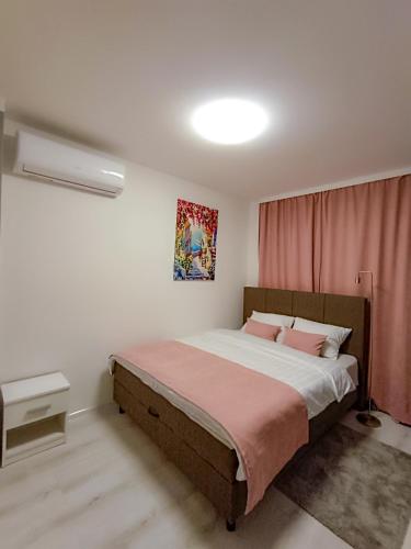 Ένα ή περισσότερα κρεβάτια σε δωμάτιο στο Apartments Ajša