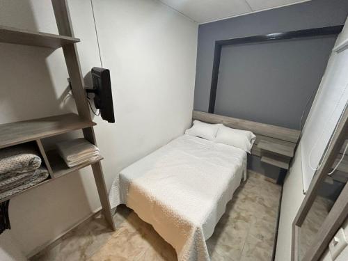 Ein Bett oder Betten in einem Zimmer der Unterkunft Hostel Quinta Camacho